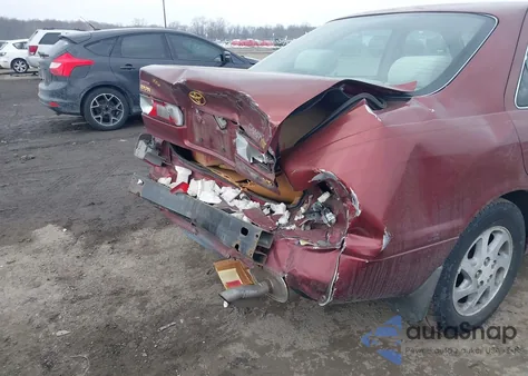 1999 Toyota Camry Le V6 z USA, uszkodzony, nr VIN 4T1BF22K9XU079541